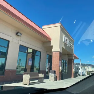 a view of the outside of a restaurant