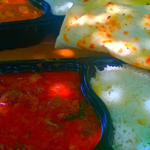 Lamb vindaloo, chicken tikka massala and an order of naan