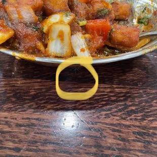 Spiders crawling around the food. And yeah its baby corn manchurian.