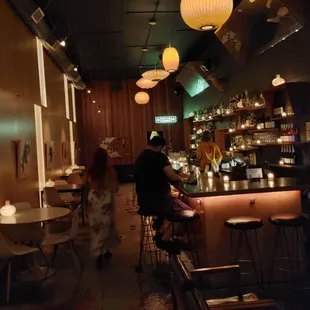 people sitting at the bar