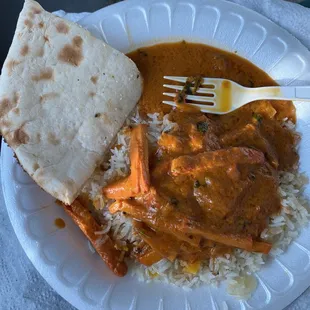 Butter Chicken over fruit polao and Peshawari Naan