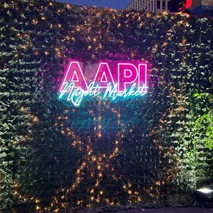 AAPI night market selfie background