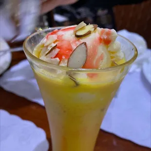 a close up of a dessert in a glass