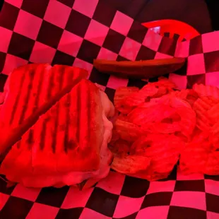 a sandwich and potato chips