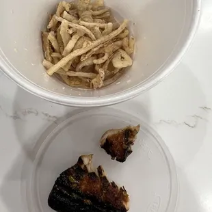 Burnt salmon and can onion fries not cooked.