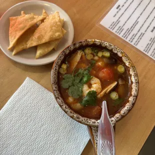 Delicious Tom yum soup with wontons!