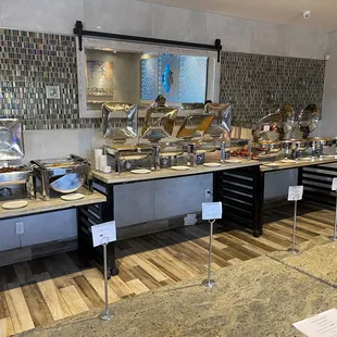This is the weekend buffet set up for COVID protection. They have a staff member serving the items.  Felt very safe and food just as good!