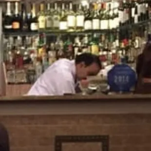 a man sitting at a bar