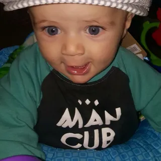 Kam W.