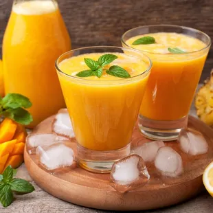 Mango Lemonade: A refreshing escape featuring a blend of sweet and tangy mango juice combined with the tartness of fresh lemonade!