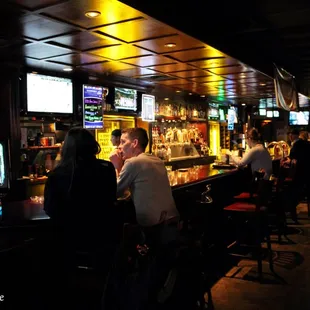 people sitting at the bar
