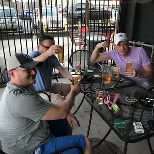a group of people sitting around a table