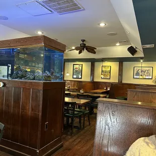 a fish tank in the middle of the room