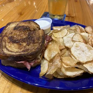 Rueben sando with house made chips and a side of ranch.