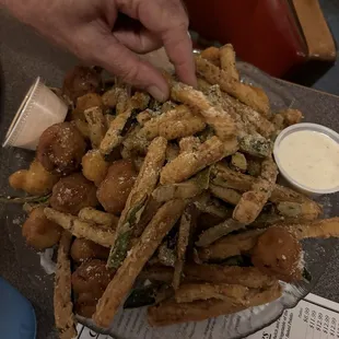 Fried veggie combo, which is mushroom zucchini, and cauliflower