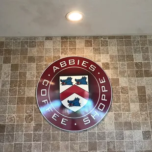a logo on the wall