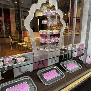 a display of cupcakes