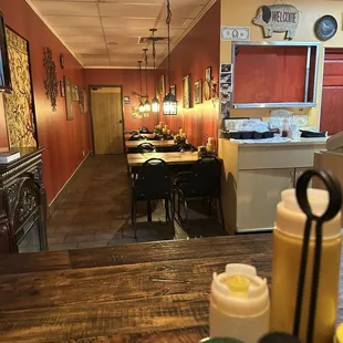 Inside the establishment, on the smaller side but nice and quiet where you could focus on dinner or your guest!