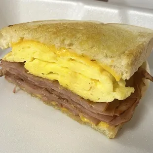 Breakfast Sandwich (half) is piled high and yummy