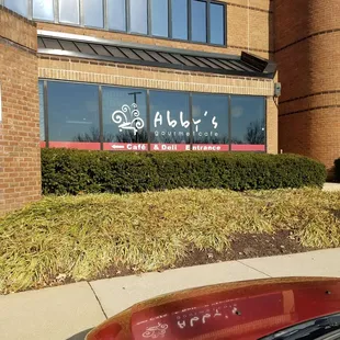 a car parked in front of a building