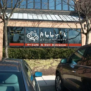 cars parked in front of a building