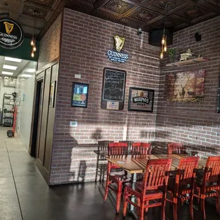 a brick wall and tables