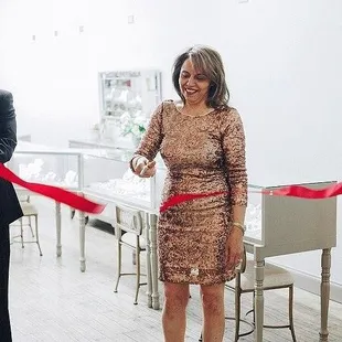 Abby cutting the ribbon at the grand opening for our Woodland Hills Mall location