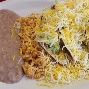 Crispy tacos with rice and beans.
