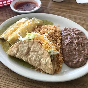 Combo Plate..Chicken Chilada, Tamale, Taco, Rice and Beans
