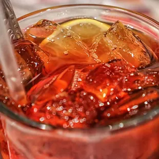 a close up of a glass of iced tea