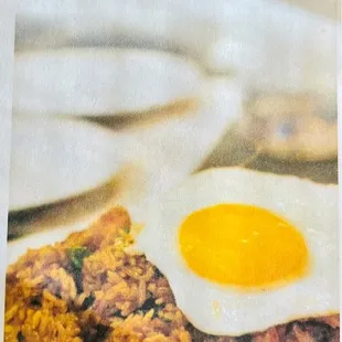 a plate of food with a fried egg