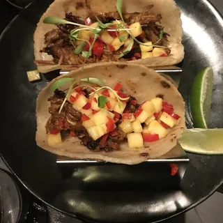 Crispy BBQ pork tacos, pickled pineapple, fresno chili relish