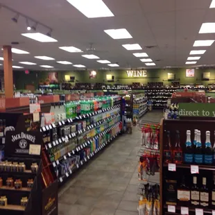 the aisle of a liquor store