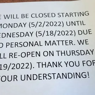 a sign stating that we will be closed starting monday