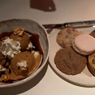 a bowl of ice cream and cookies