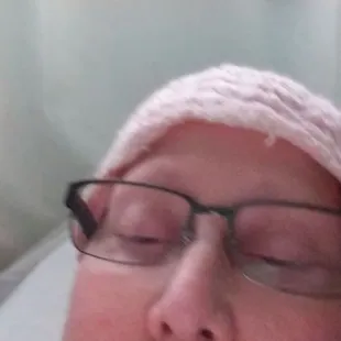 a woman in a hospital bed