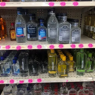 bottles of alcohol on shelves in a store