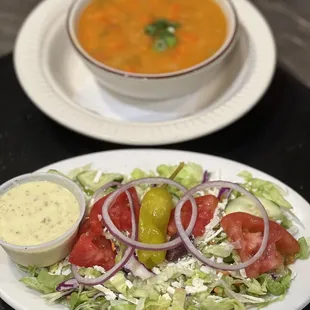 a plate of salad and a bowl of soup