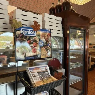 Takeout view. Newspapers Togo boxes and sangria by the dozen. My kind of place!