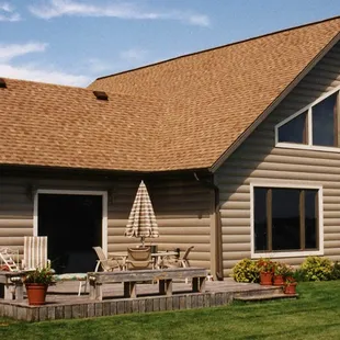 Log siding... but with a modern twist! Switch out those traditional logs for sleek Steel siding instead!