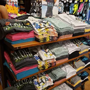 a woman shopping in a clothing store