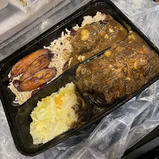 Oxtail with cabbage and rice &amp; peas.