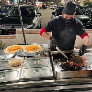 Abel making two HUGE burritos