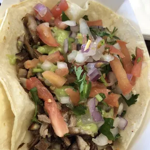 a taco with various toppings