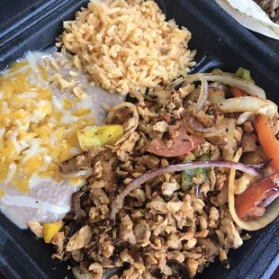 a meal in a styrofoam container