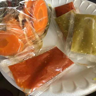 a plate of food wrapped in plastic
