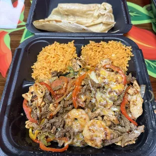Combination number 23, fajitas mixed. Shrimp, chicken, and steak fajitas with double rice, no refried beans and tortilla.