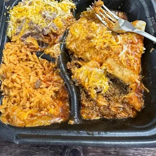 Enchilada plate with hair in the cheese that was found inside the enchilada.