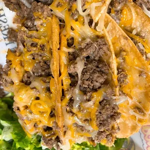 a closeup of a taco and lettuce