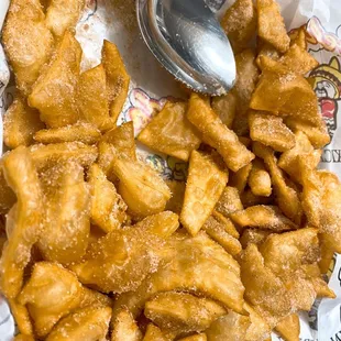 a closeup of a plate of fried food